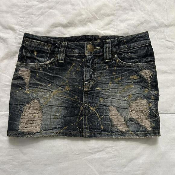 D.i.a. Distressed denim micro mini skirt with gold paint splatter